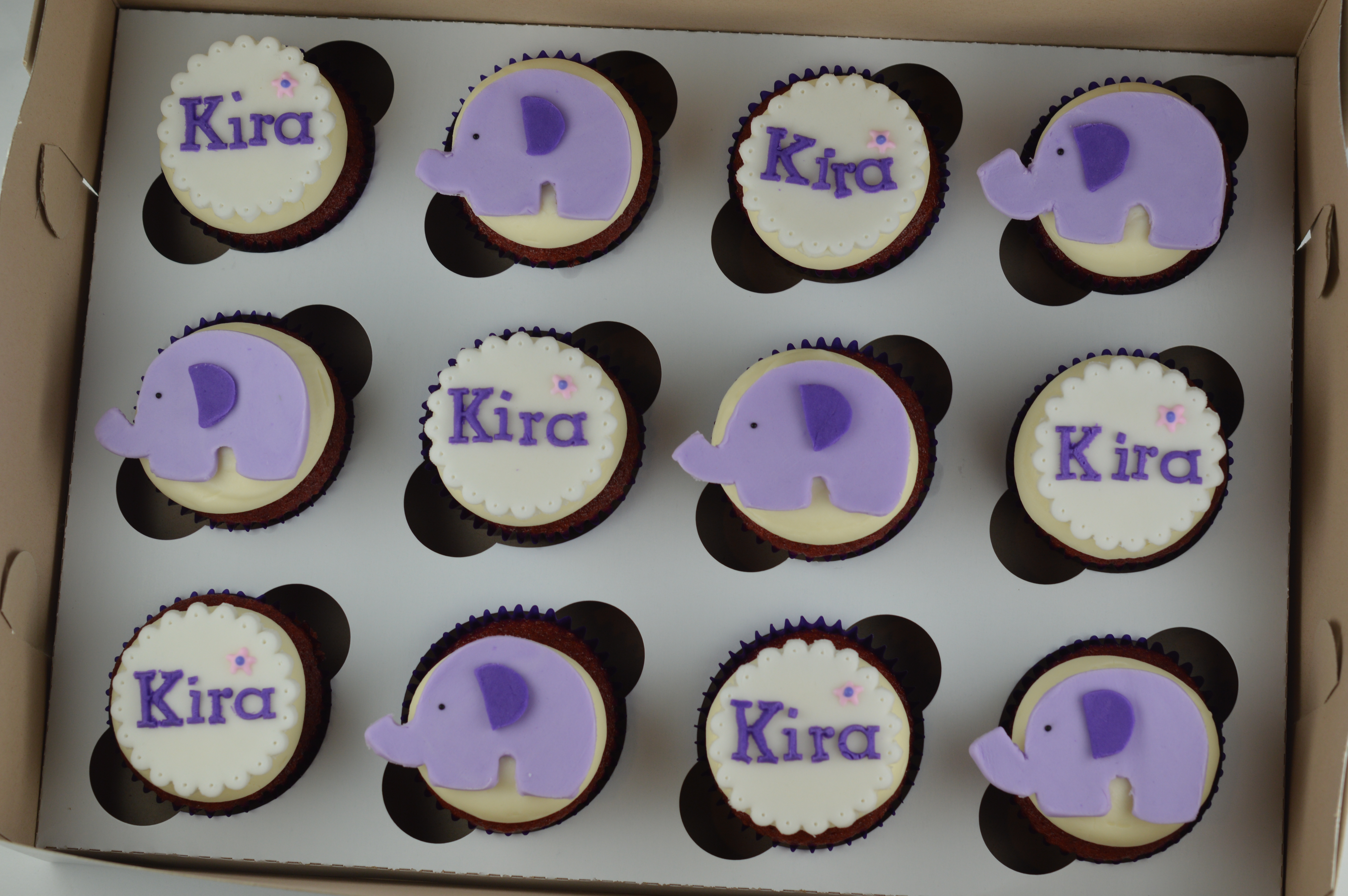 purple baby shower cupcakes